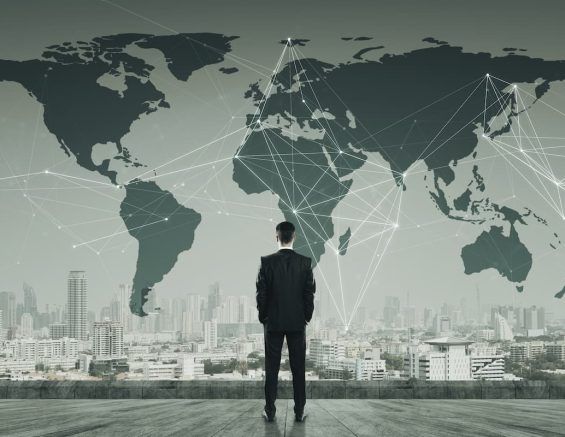 Man Looking at Globe